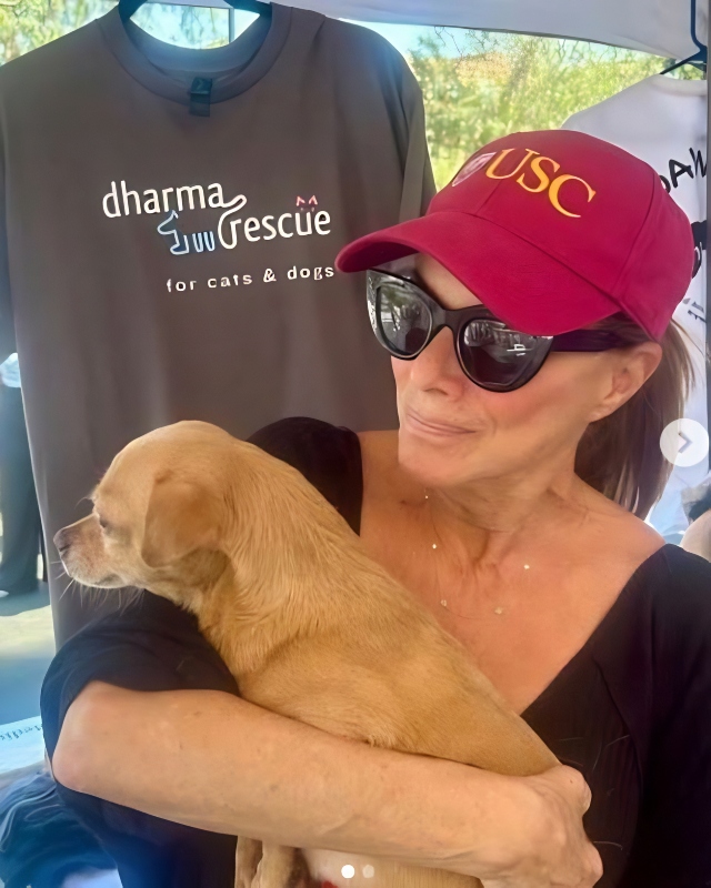 Nancy with Coco at a charity event - Instagram