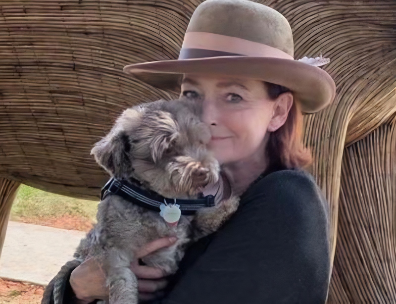 Carolyn with her pup - @carolynhennesy - Instagram
